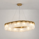 Oval Crystal Fringe Chandelier with Warm Gold Finish – lights on