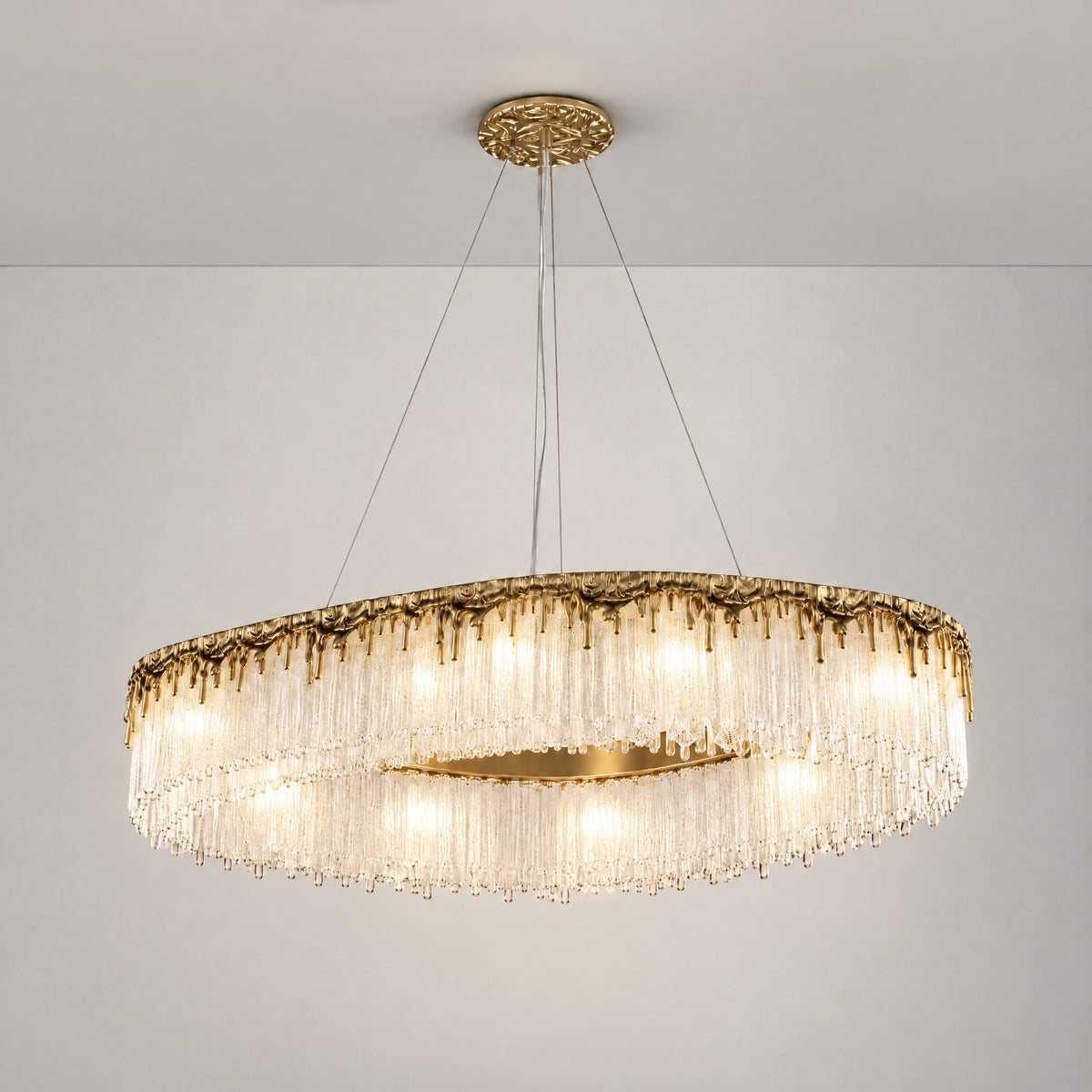 Oval Crystal Fringe Chandelier with Warm Gold Finish – lights on