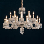 Riventa Clear Crystal 24-Light Chandelier 41.7" on a deep teal-blue wall