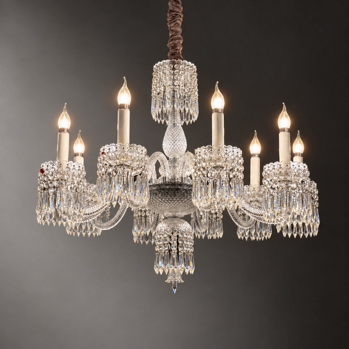 Suvana Clear Curved Crystal 10-Light Chandelier 34.3" on a dark olive wall