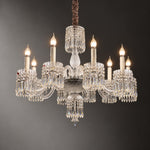 Suvana Clear Curved Crystal 10-Light Chandelier 34.3" on a dark olive wall