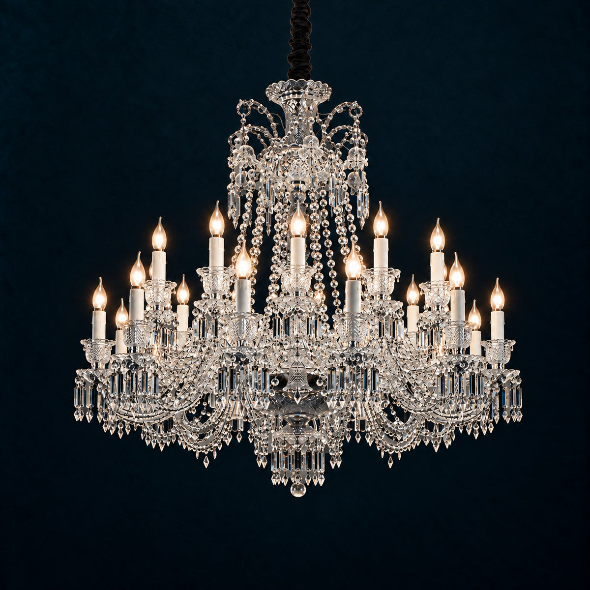 Tavora Clear Candle Crystal 24-Light Chandelier 42.5" on a deep teal-blue wall