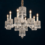 Ursella Clear Curved Crystal 8-Light Chandelier 28.3" on a deep teal-blue wall