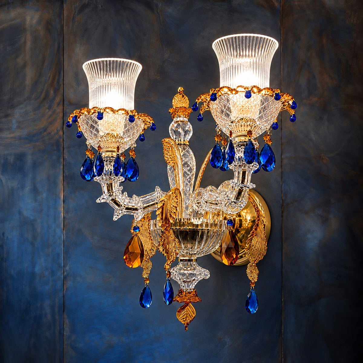 Valtore Blue Amber Glass 2-Light Wall Sconce 13" on a dark blue-grey wall