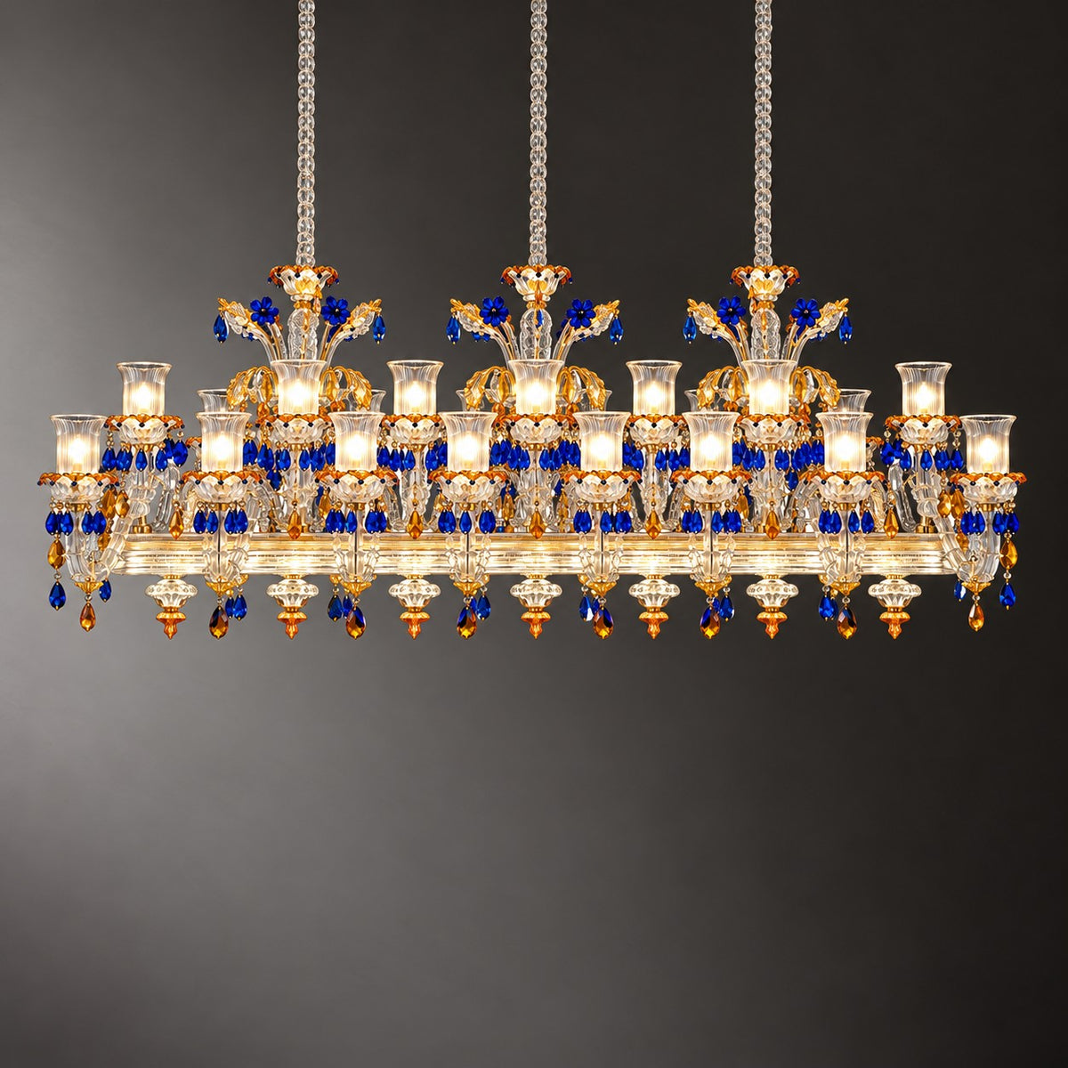 Verenza Amber Glass 46-Light Linear Chandelier 103.5" on a dark olive wall