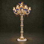 Vionelle Blue Amber Glass 16-Light Floor Lamp 102.4" on a dark olive wall