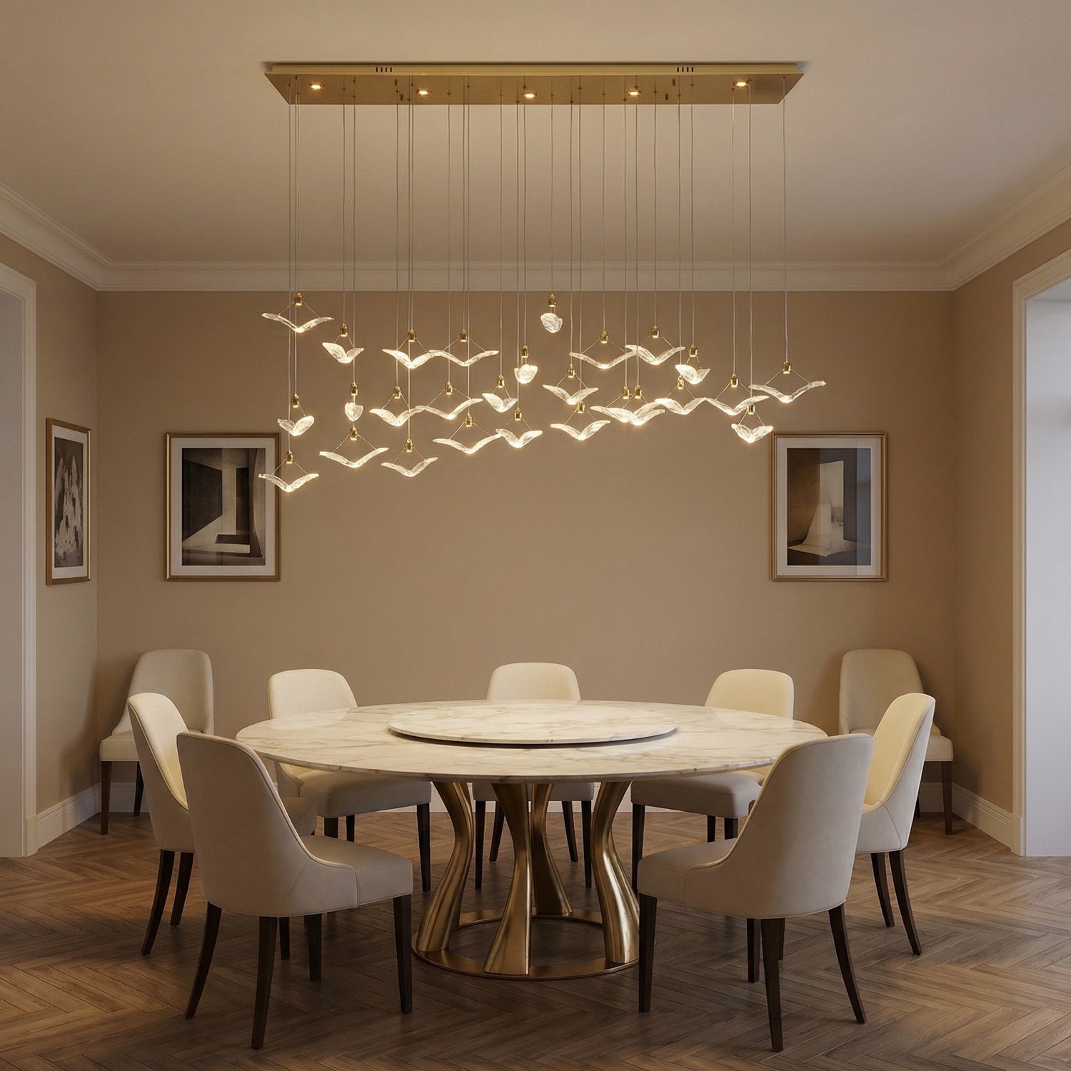 Cascading handmade glass pendant over kitchen island with marble countertop — Yiosi Crane linear chandelier