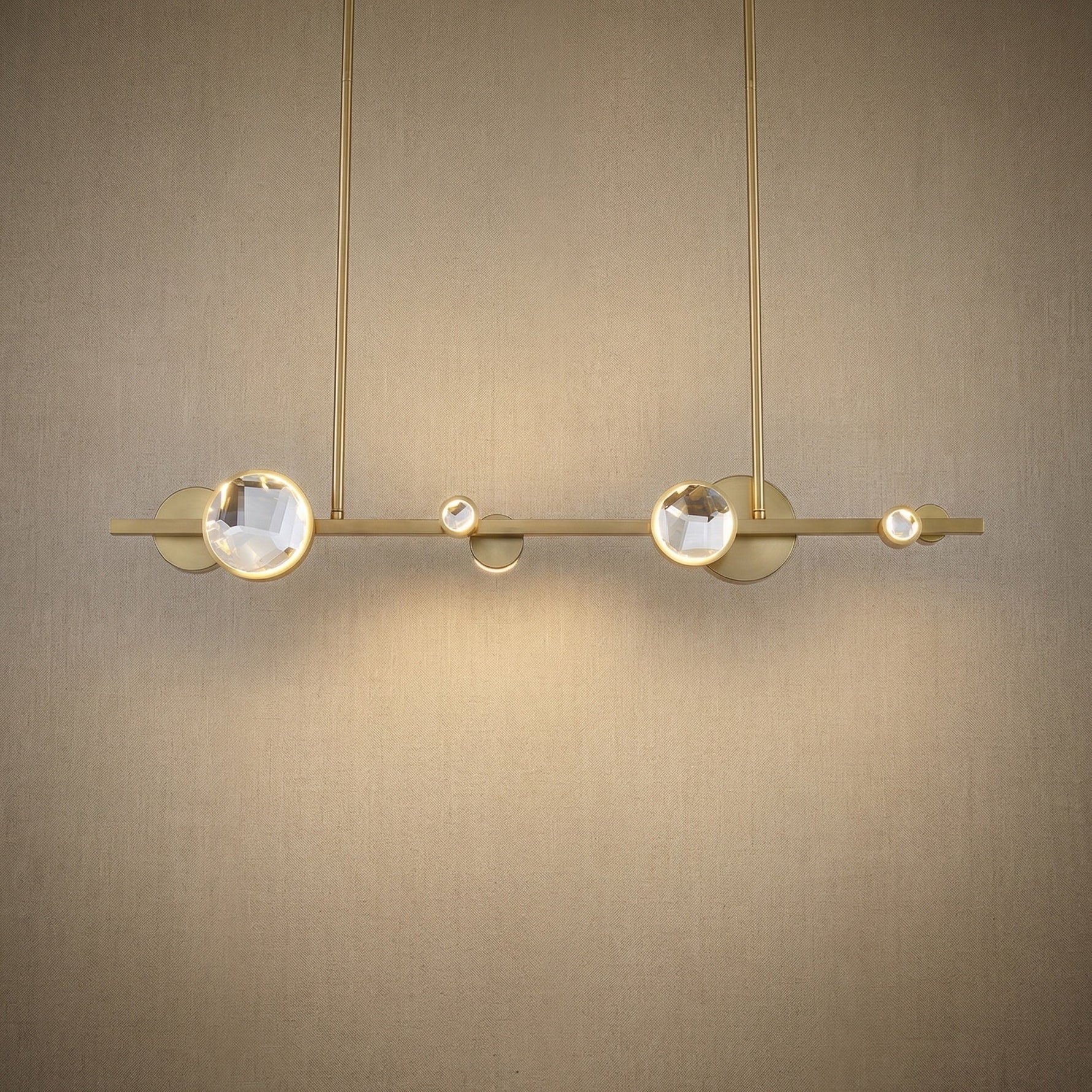 Modern dining room K9 crystal linear chandelier over long oak table — Yiosi Eclipse 47 inch pendant