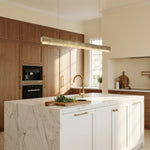 50 inch crystal bar pendant over kitchen island marble countertop — Yiosi Hudson chrome chandelier