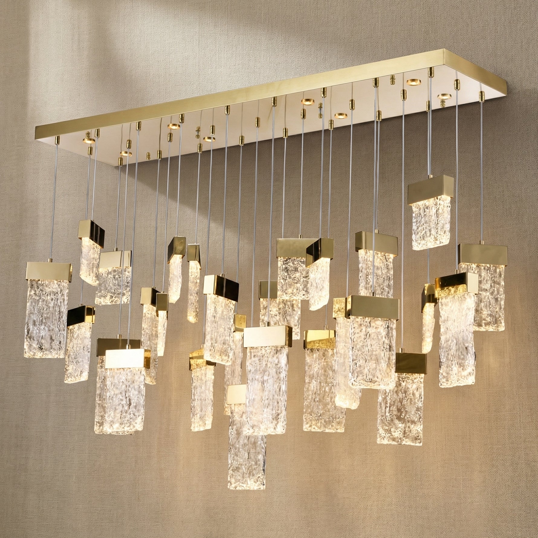 Yiosi Knox 47 inch linear fluted glass chandelier with champagne gold finish — modern dining pendant