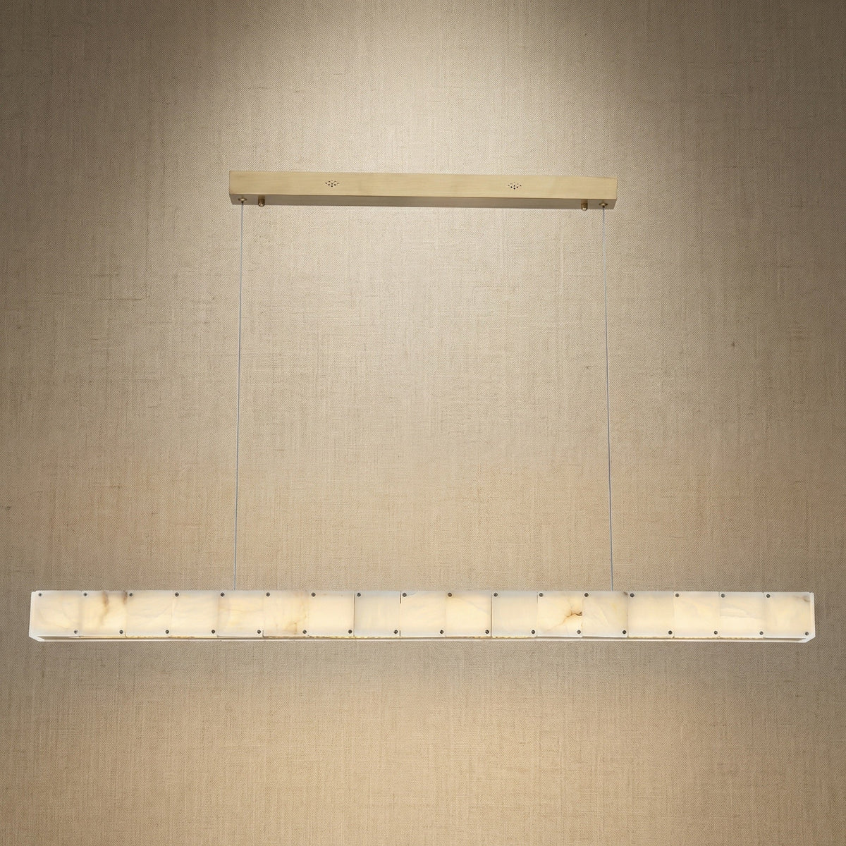 Yiosi Madison 48 inch alabaster linear chandelier with champagne gold finish — modern dining pendant
