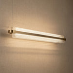 Yiosi Ribbon acrylic ribbed glass linear chandelier with antique brass finish — modern dining pendant