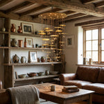 Yiosi Cascading Copper flush mount ceiling chandelier in rustic cottage living room with exposed wood beams and pottery shelf