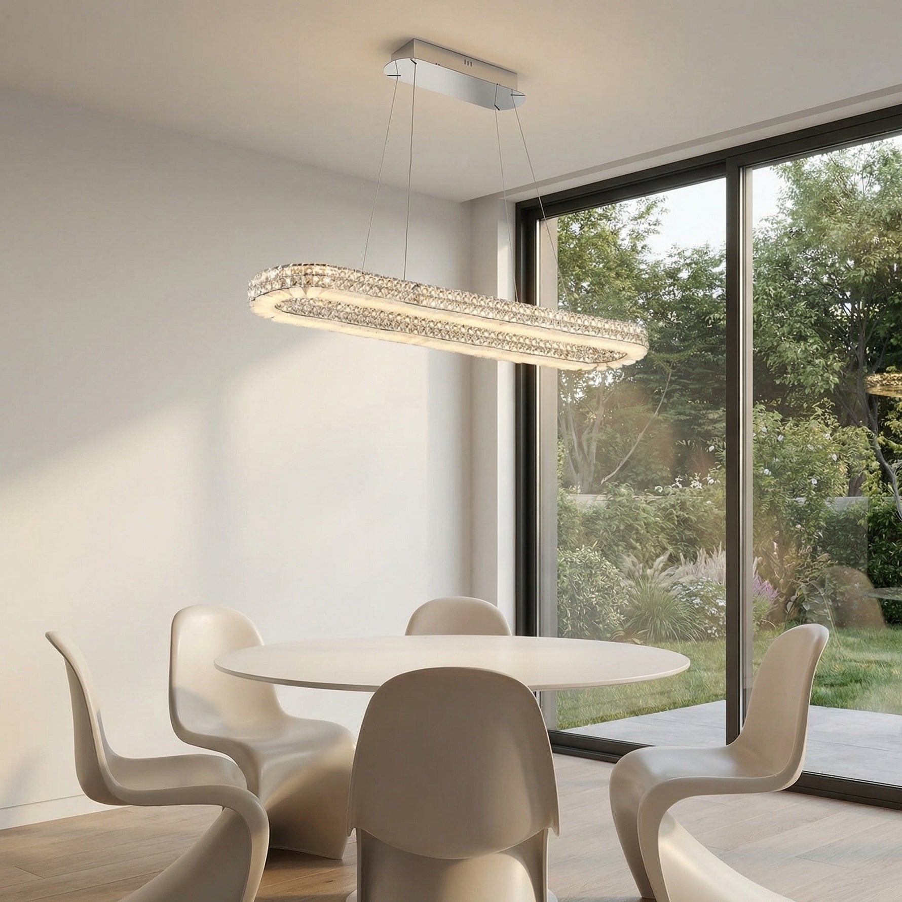 47 inch oval crystal pendant over kitchen island marble countertop — Yiosi Vera chandelier