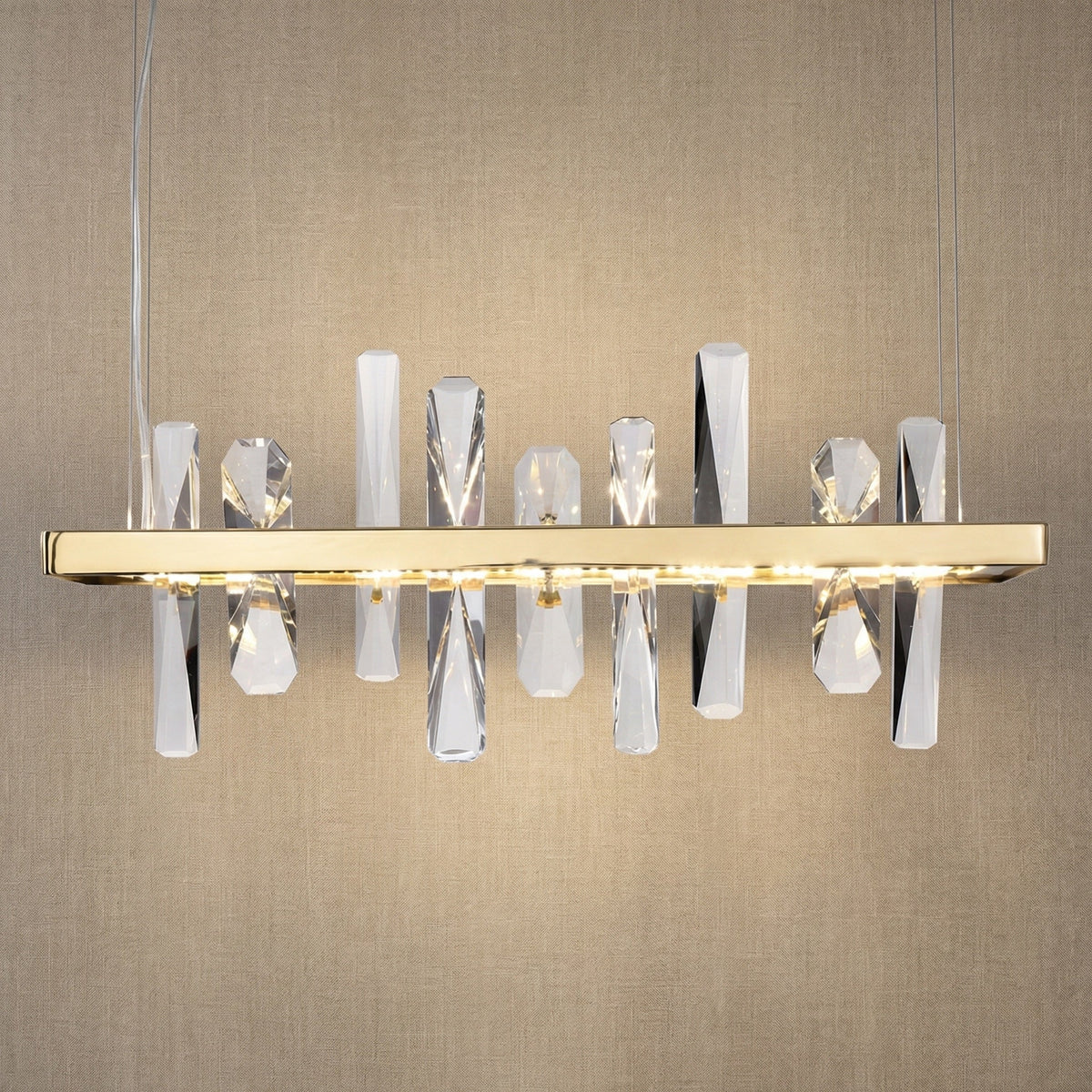 Yiosi Nora 22 inch linear crystal pendant chandelier with champagne gold finish — modern accent pendant