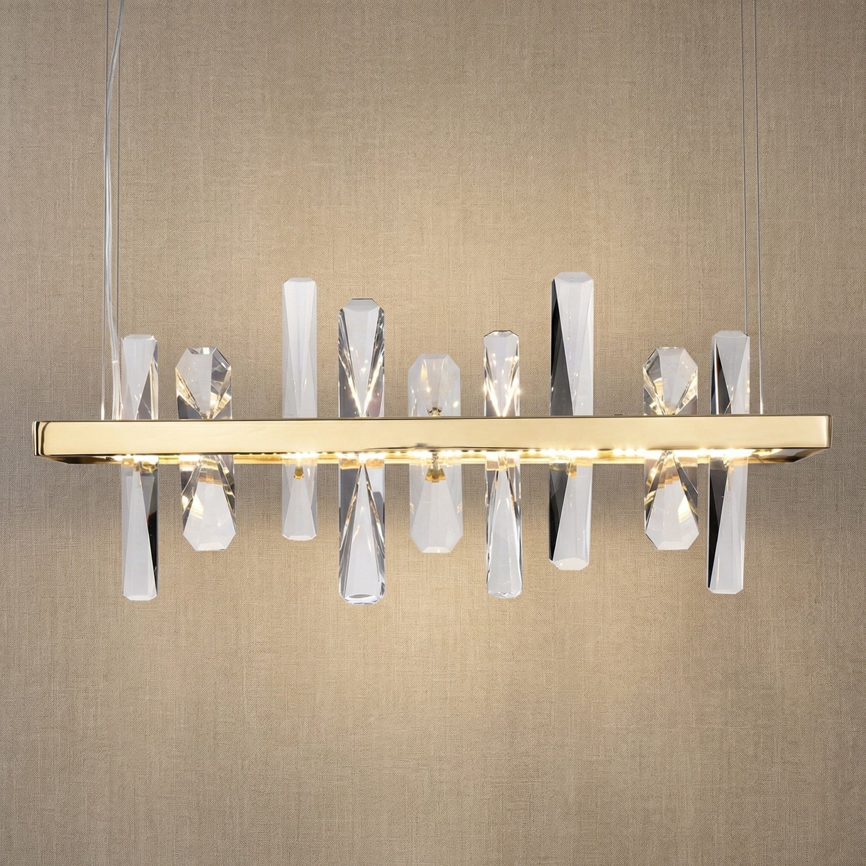Yiosi Nora 22 inch linear crystal pendant chandelier with champagne gold finish — modern accent pendant