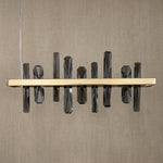 Yiosi Nora 22 inch linear crystal pendant in modern American interior