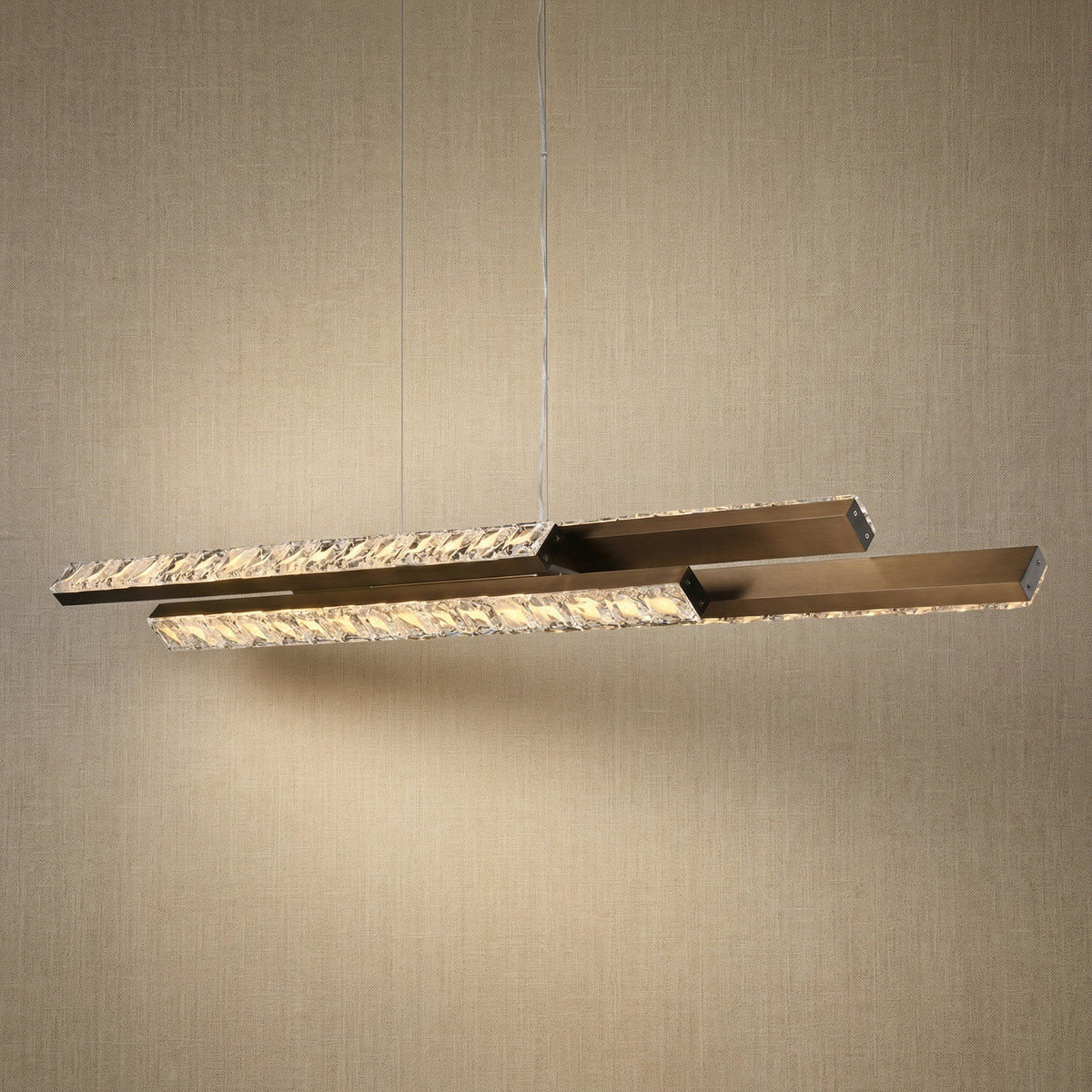 Yiosi Drake 54 inch bubble crystal linear chandelier with antique brass finish — modern dining pendant