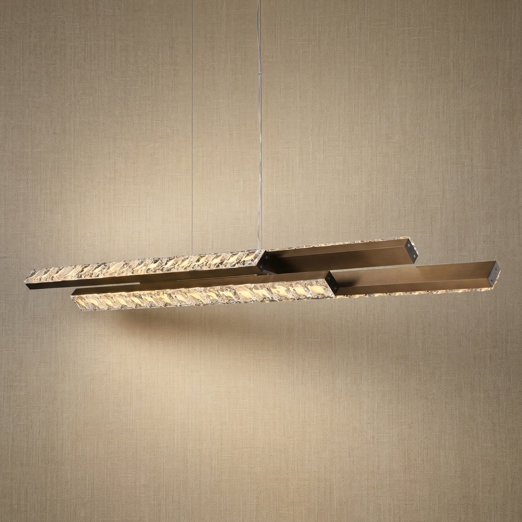 Yiosi Drake 54 inch bubble crystal linear chandelier with antique brass finish — modern dining pendant