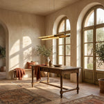 54 inch linear crystal pendant over kitchen island marble countertop — Yiosi Drake antique brass chandelier