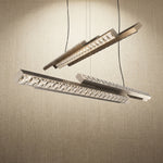 Yiosi Drake 63 inch bubble crystal linear chandelier with antique brass finish — modern dining pendant