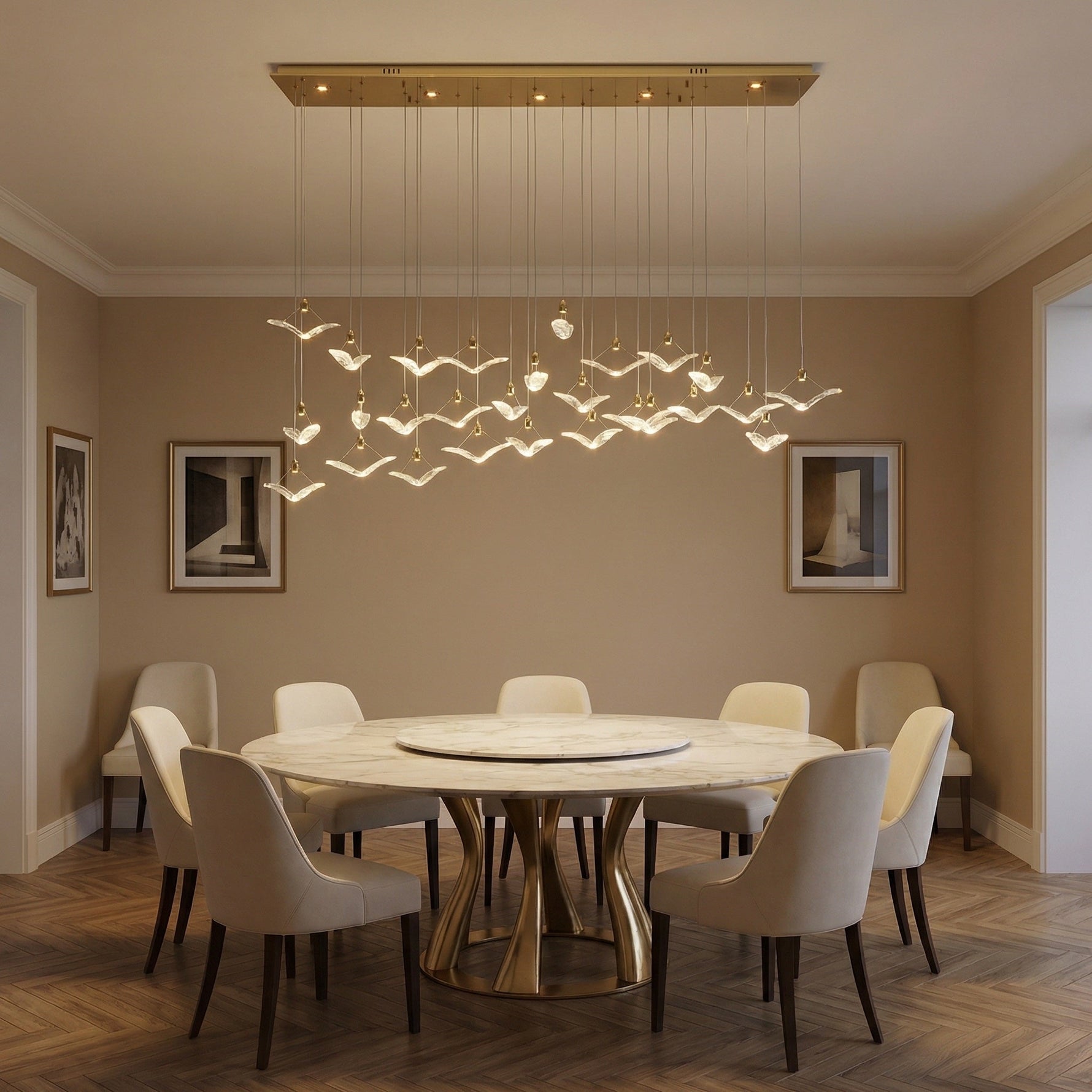 Cascading handmade glass pendant over kitchen island with marble countertop — Yiosi Crane linear chandelier
