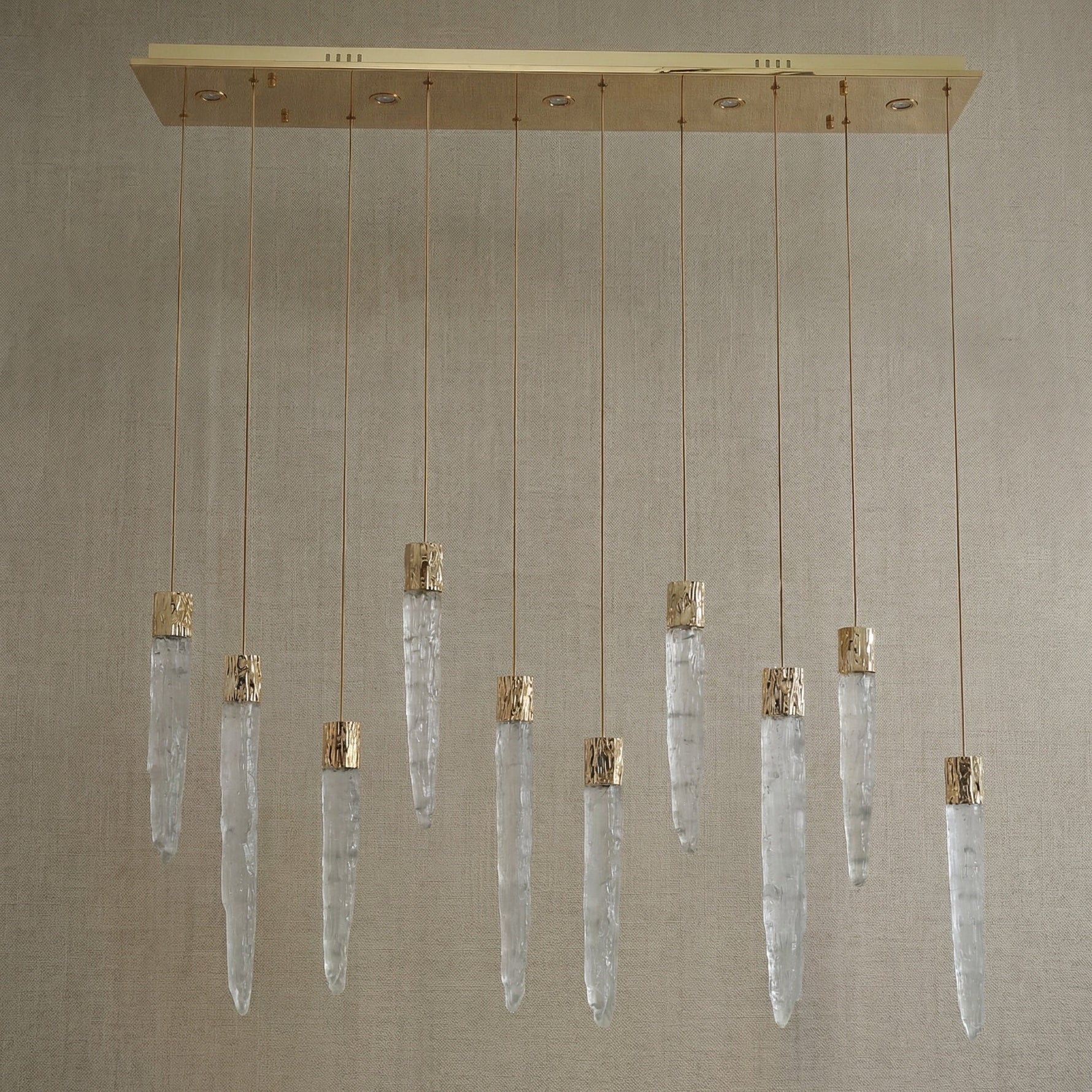 Yiosi Halsey 47 inch K9 crystal icicle linear chandelier with gold finish — modern dining pendant