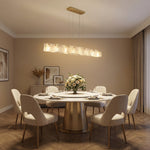 Modern dining room 63 inch linear glass chandelier over round table — Yiosi handmade textured glass pendant
