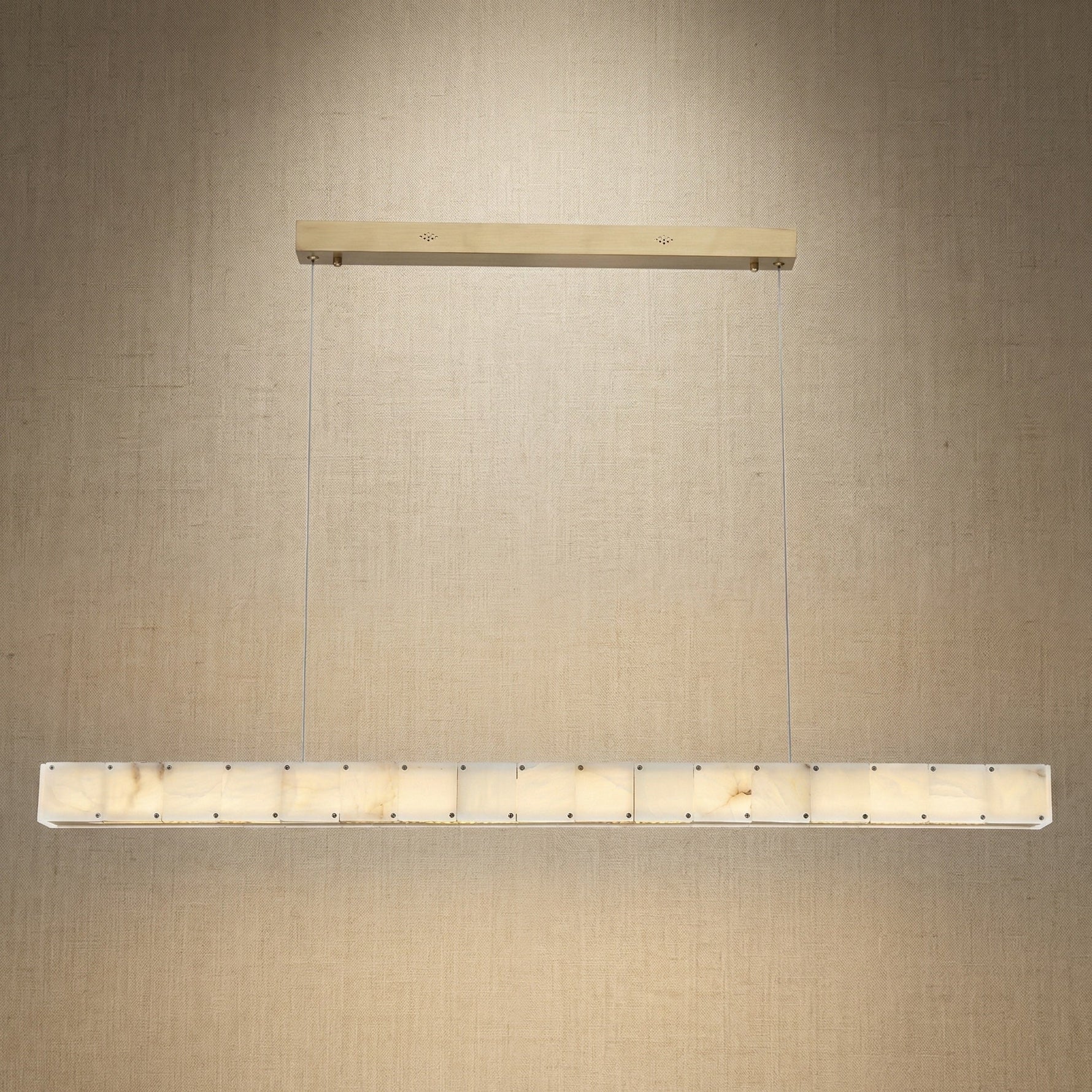 Yiosi Madison 48 inch alabaster linear chandelier with champagne gold finish — modern dining pendant