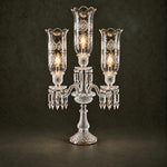 Zerinta Hurricane Crystal 4-Light Table Lamp 30.3" on a dark olive wall