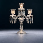 Zomera Candelabra Crystal 4-Light Table Lamp 21.7" on a deep teal-blue wall